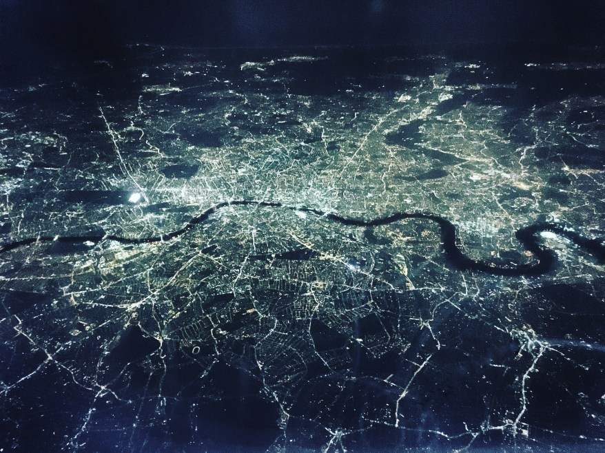 Aerial view of London lights at night from a plane